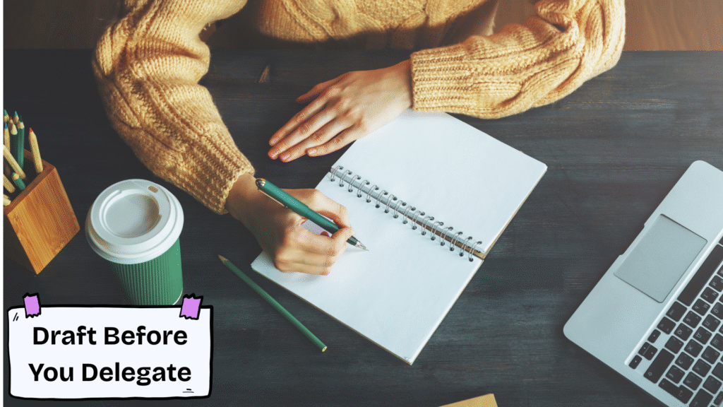 To avoid AI dependence, a hand hovers with a pen over a notebook before opening a laptop to write an initial draft.